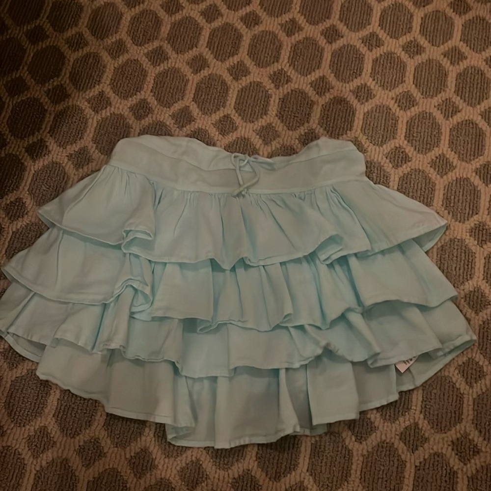 Mini light blue ruffle skirt